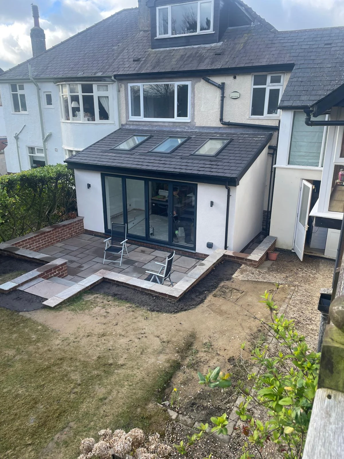 Completed rear extension with rooflights and glazed garden doors