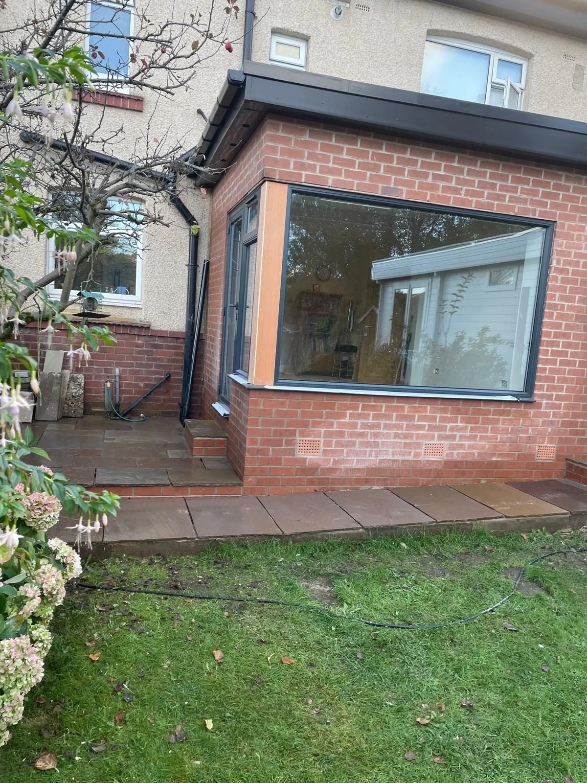 Brick rear extension with a large glazed window